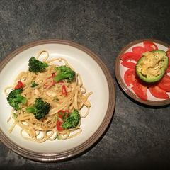 A picture of Garlic and red chilli linguini and avocado starter.