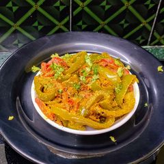A picture of Capsicum Tomato Dry Curry with Mustard Paste.