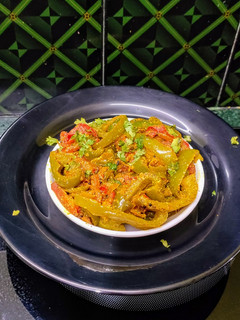 A picture of Capsicum Tomato Dry Curry with Mustard Paste.