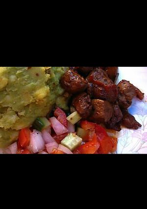 A picture of Pan fried liver with bacon.