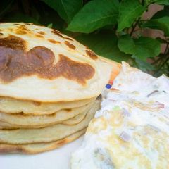 A picture of Pancakes and eggs.