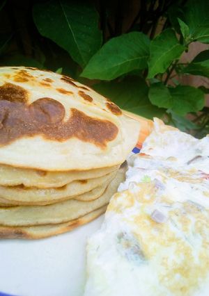 A picture of Pancakes and eggs.