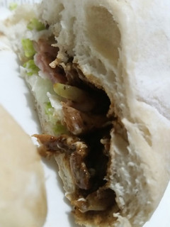 Una foto de Sándwich de cerdo en salsa teriyaki