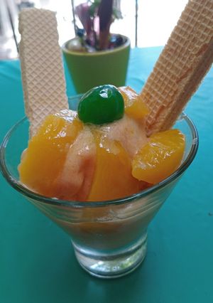 Una foto de HELADO DE DURAZNO🍑,PELONES Y JUGO 🍑 DE 😍😍😍🍊NARANJA🍊