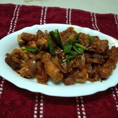 A picture of Baby Corn Manchurian with spring onion.