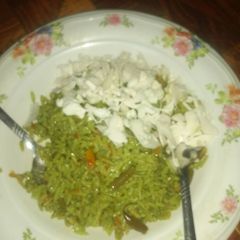 A picture of Coloured jollop rice with cabbage.