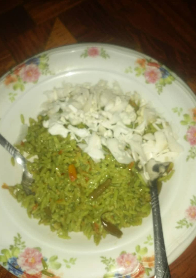 A picture of Coloured jollop rice with cabbage.