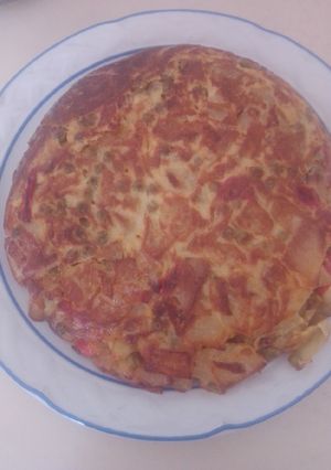 Una foto de Tortilla campreste con guisantes
