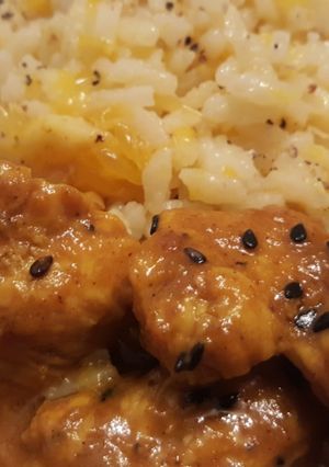 Una foto de Pollo con arroz a la naranja