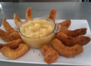 Una foto de Camarones al coco