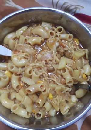 A picture of Soupy macaroni and maggi masala.