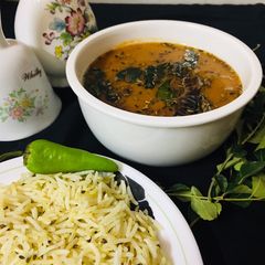 A picture of 🌺Khatti daal and zeera rice.