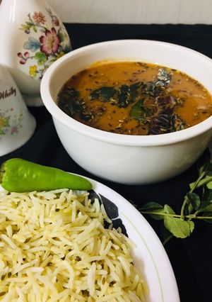 A picture of 🌺Khatti daal and zeera rice.