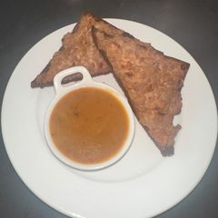 A picture of Kanom pang na moo - Thai pork toast “pork on face of bread” 😂.