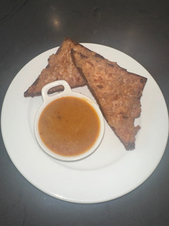 A picture of Kanom pang na moo - Thai pork toast “pork on face of bread” 😂.
