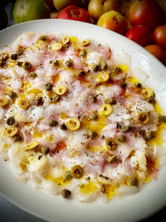 Una foto de Carpaccio de bacalao