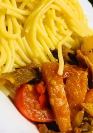 A picture of Pasta with beef stir fry.