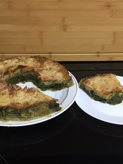 Una foto de Rosco de puré de patatas relleno de espinacas