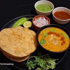 A picture of Protein rich Sindhi Dal Pakwan for breakfast or brunch.