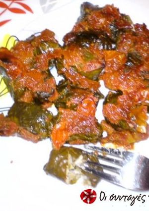 A picture of Dolmadakia in the oven.