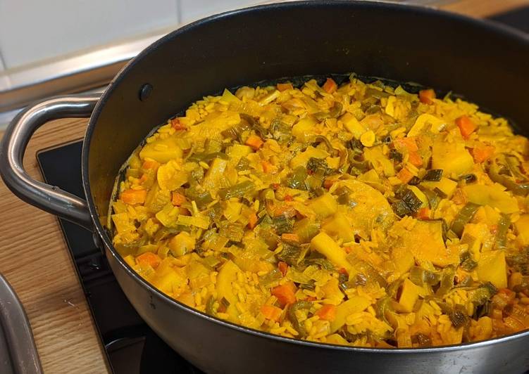 Bacalao con arroz, patatas y verduras