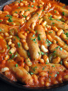 A picture of Chipolatas & Cannellini Beans in Mexican Tomato Sauce.