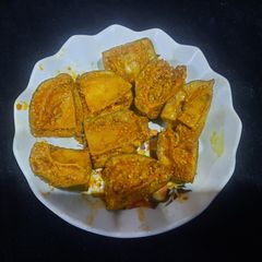 A picture of Raw mango pickle.