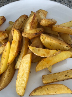 Una foto de Patatas al horno tipo gajo