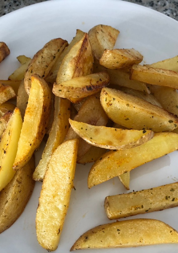 Una foto de Patatas al horno tipo gajo