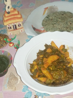 A picture of Flat beans and potatoes with chapati.