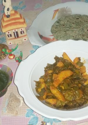A picture of Flat beans and potatoes with chapati.