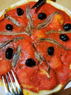 Une photo de Pâte à pizza fine et moelleuse