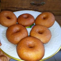 A picture of Soft and fluffy doughnuts 🤩😋.