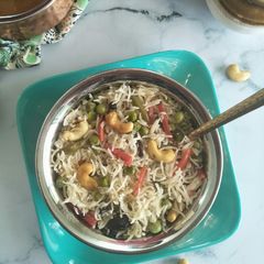 A picture of Vegetable Pulao (Rice Cooked With Veggies And Spices).
