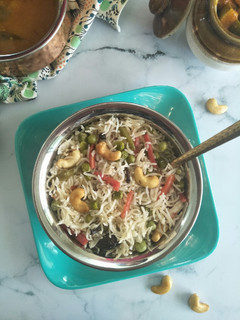 A picture of Vegetable Pulao (Rice Cooked With Veggies And Spices).