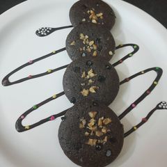 A picture of Chocolaty Idli with wheat flour and Jaggery Eggless.