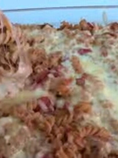 Una foto de Espirales con queso carne y tomate