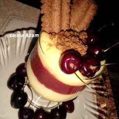 A picture of Eid ka meetha💕custard with cherry sauce🍷🍒.
