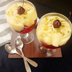 A picture of Pineapple custard with dry fruits.