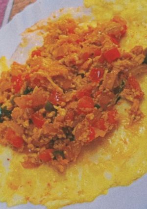 A picture of Egg Ghotala with omelette.