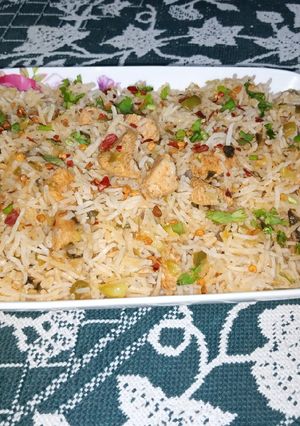 A picture of Red Chilli Capsicum Rice.