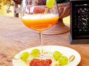 Una foto di prosciutto e melone