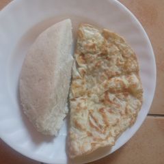 Ugali and eggs A picture of Ugali and eggs.