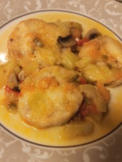 Una foto de Merluza con verduras