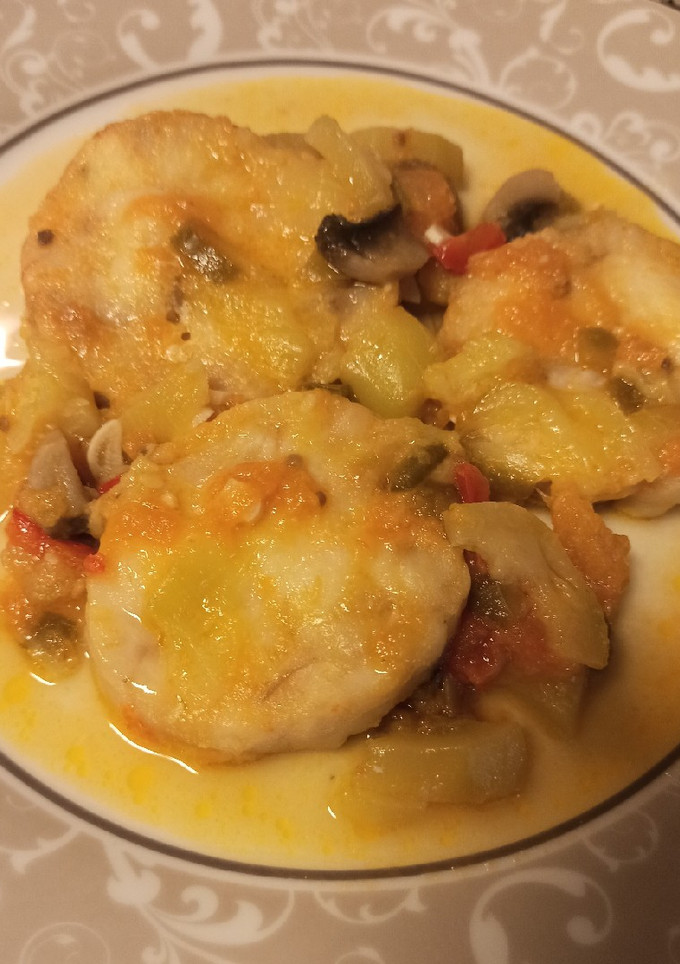 Una foto de Merluza con verduras