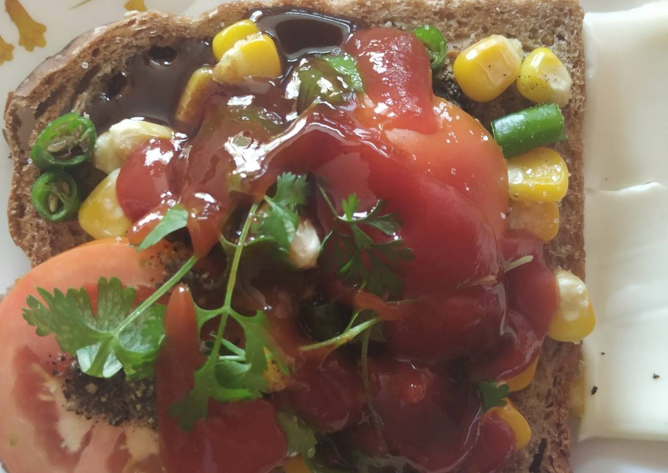 Open cheese corn and capsicum sandwich