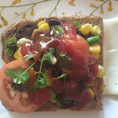Open cheese corn and capsicum sandwich A picture of Open cheese corn and capsicum sandwich.