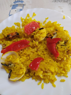 Una foto de Paella