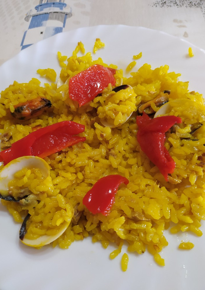 Una foto de Paella
