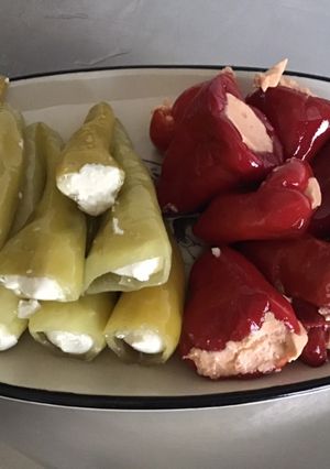 A picture of Sweet Green Peppers with Ricotta and Mini Red Peppers Stuffed with Fresh Cheese and Tomatoes.